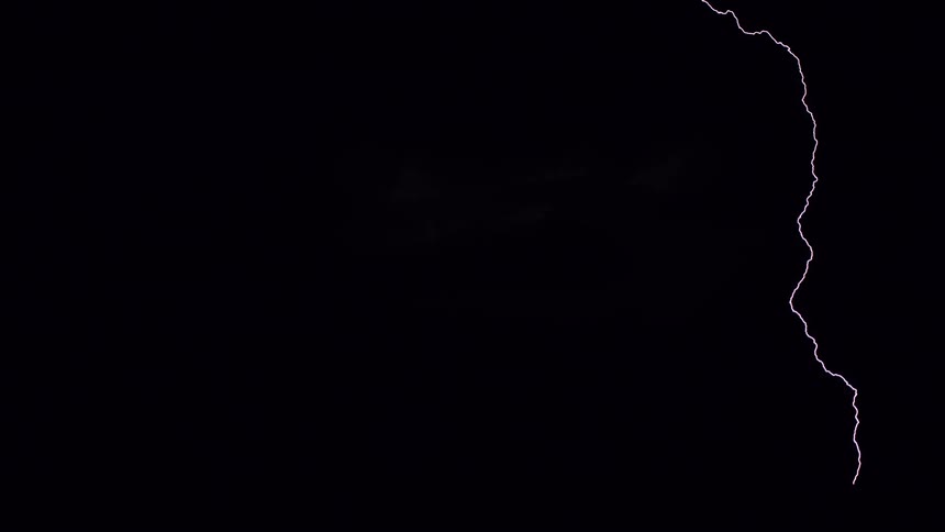 Lightning storm lights up clouds at night