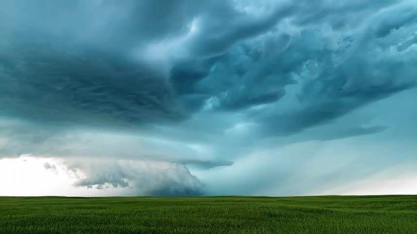 Landscape of a field and a storm with lightning