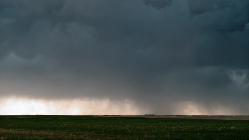 A thunderstorm is forming in the horizon