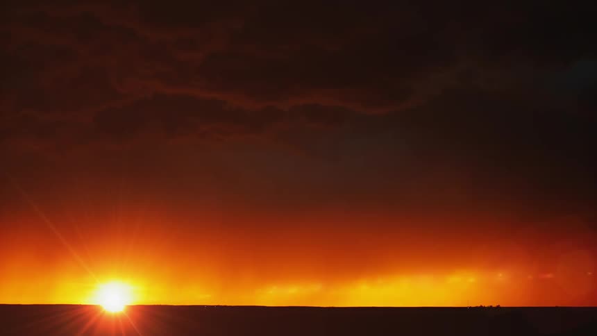 Lightning storm in the countryside at sunrise