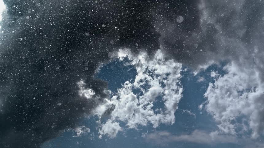 Rain falls from the sky into the camera