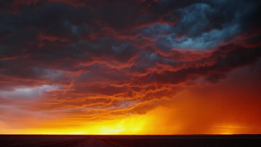 Landscape view of the sun setting and lightning