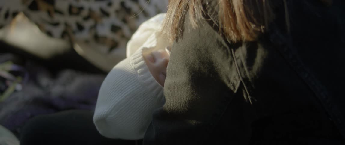 Woman holding a sleeping baby