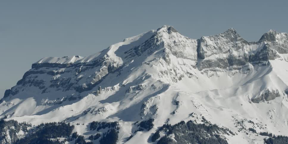 Landscape of the snowcapped mountain with cloudless sky on a sunny day