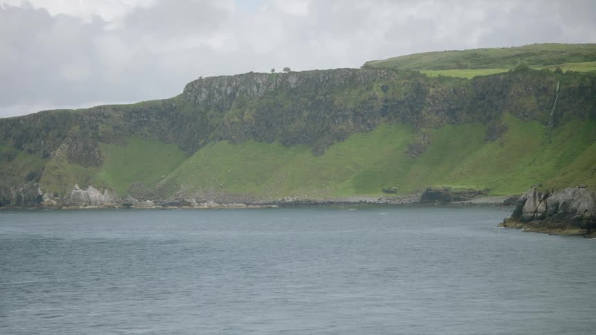 Beautiful cliffs in the distance of the water