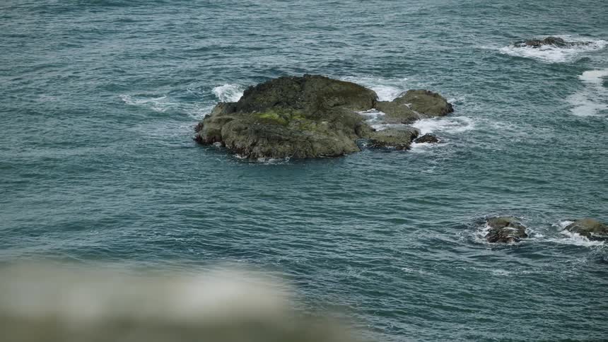 The ocean near a rocky coastline