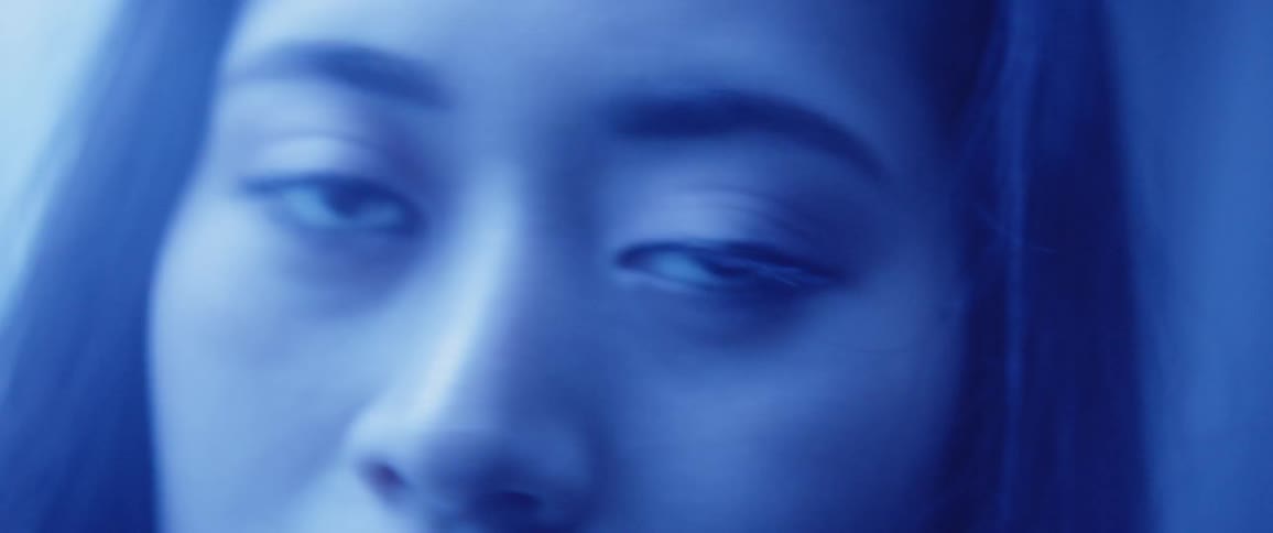 Woman stares on direction then turns away