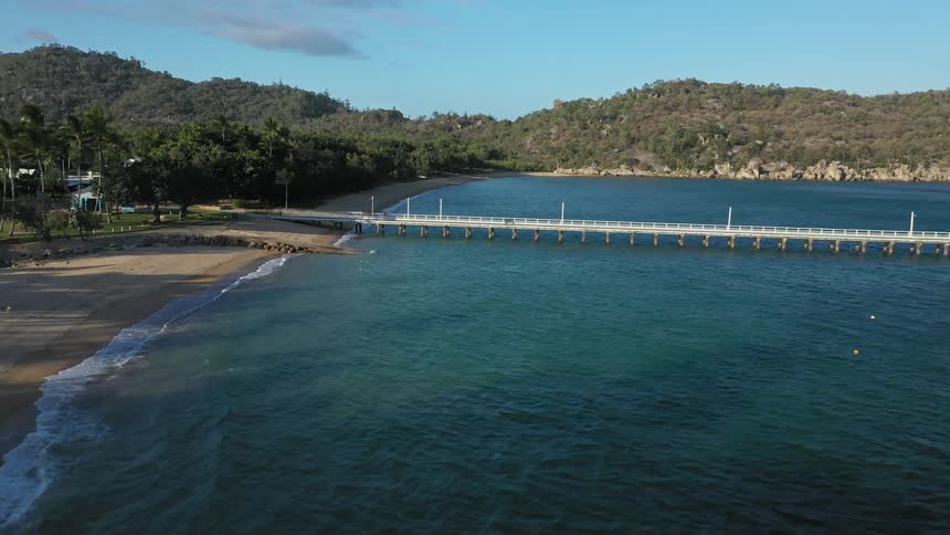 A bridge stretches across a body of water