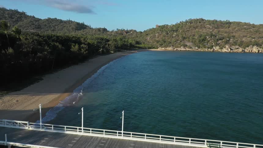 Aerial view of a pier on the coast
