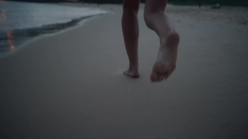 A person running in sand