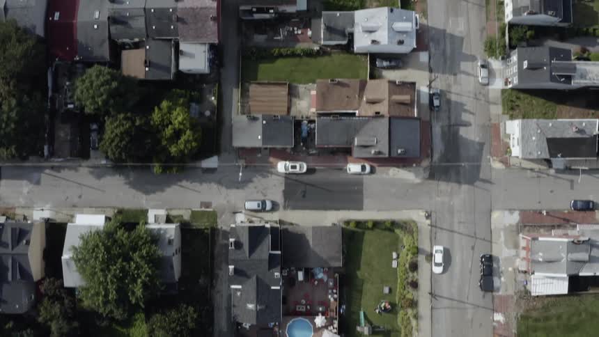 Houses and streets of a rough looking neighborhood