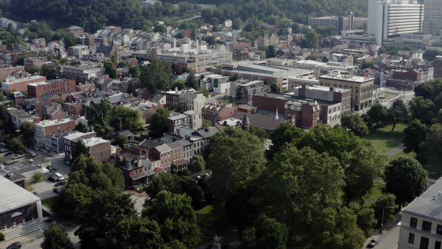 A town nestled in the middle of a forested area