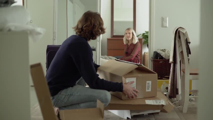 A white couple move into a new place