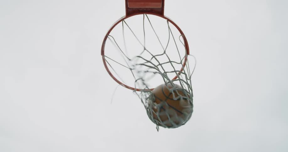 Basketball falls through hoop