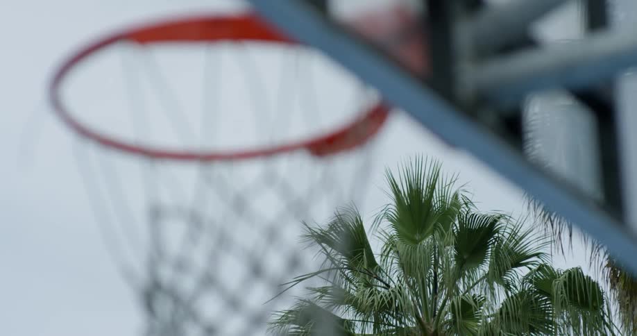 The ball bounces into the hoop