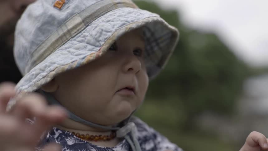Adorable Baby Smiling and Clapping Hands, Full of Innocent Joy.