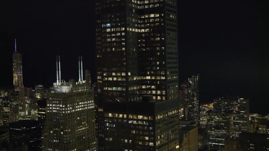 A city at night with skyscrapers and buildings