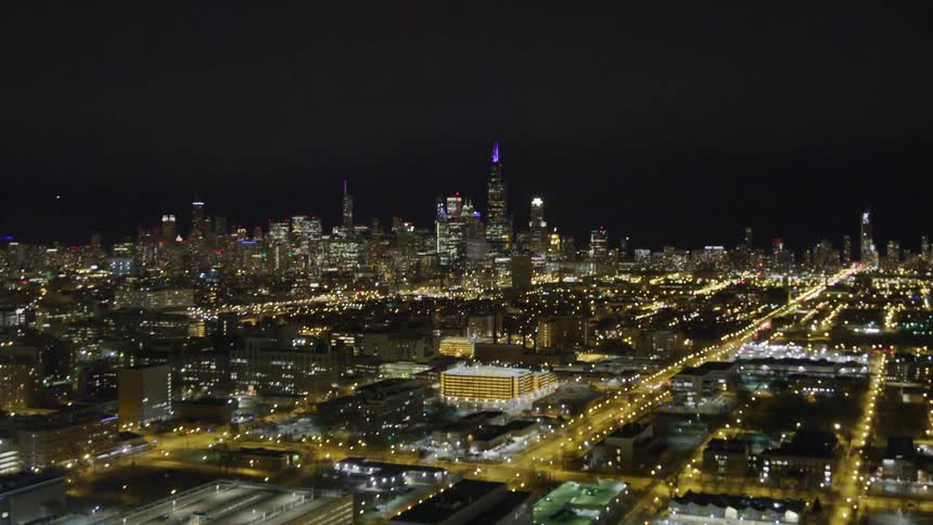 The brightly lit streets of a metropolis during the night