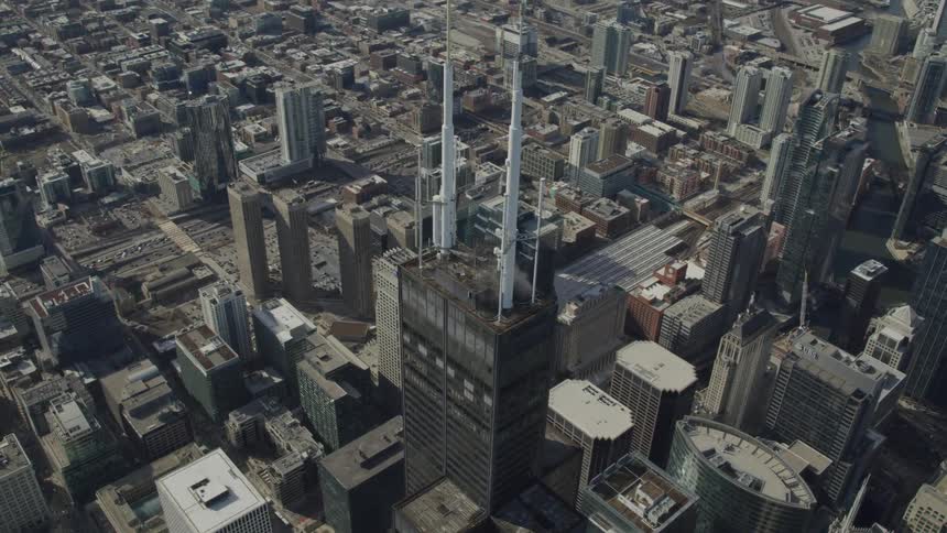An aerial view of a downtown city is displayed