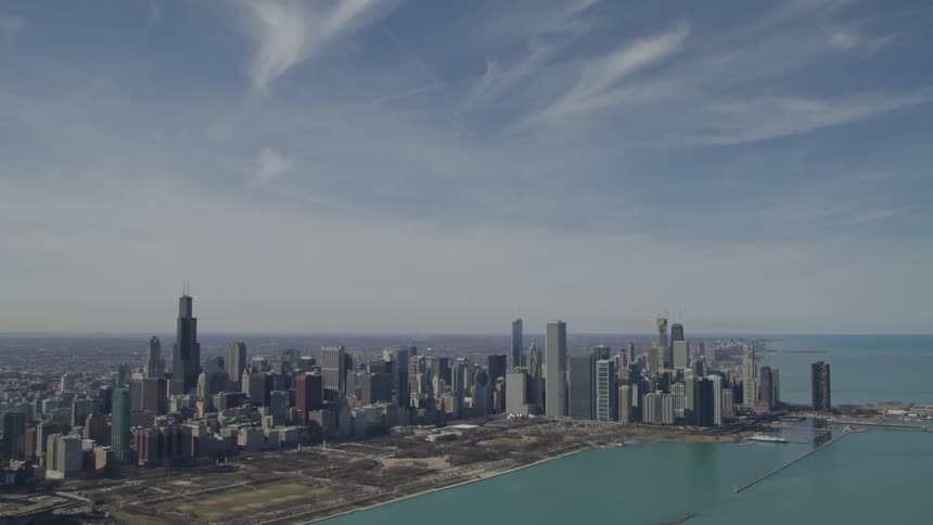 A downtown city is by the coastline