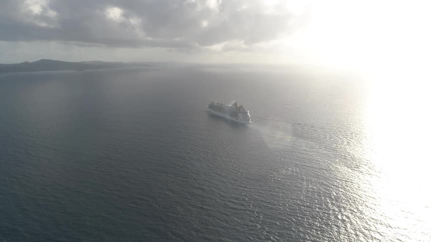 A boat is in the middle of the ocean