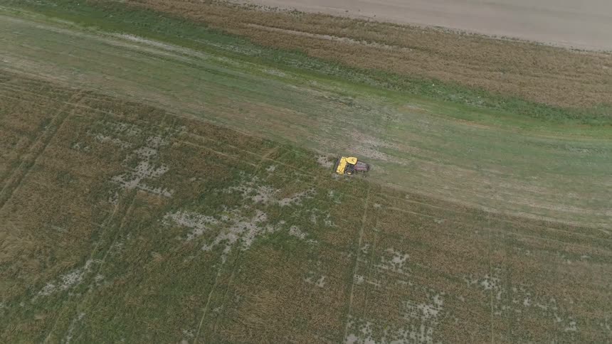 Birds eye view of tractor on a field