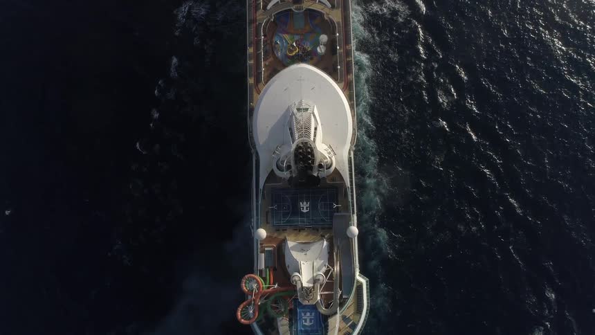 Aerial view of a ship moving through the water