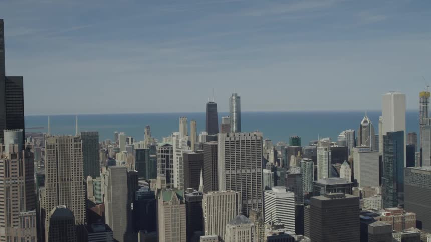 Tall buildings in a dense metropolis during the day
