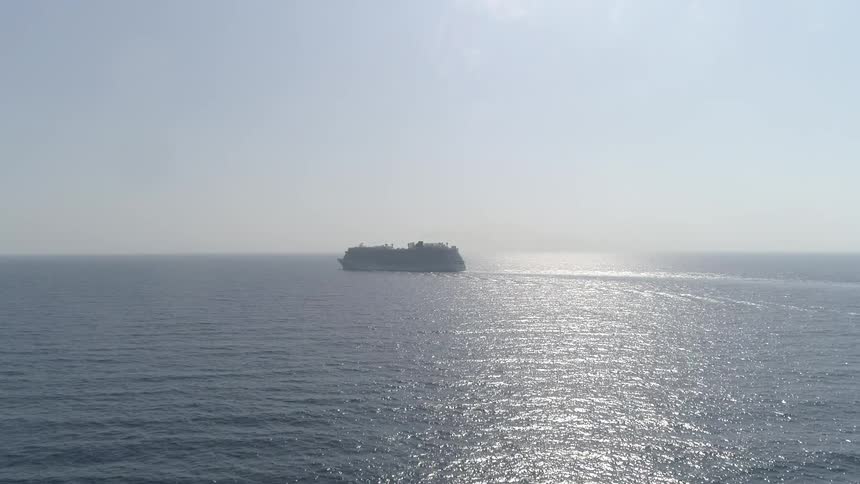 A ship sailing at middle of the sea