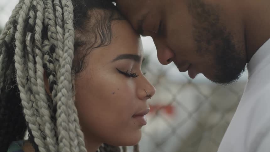 Girl and male embrace