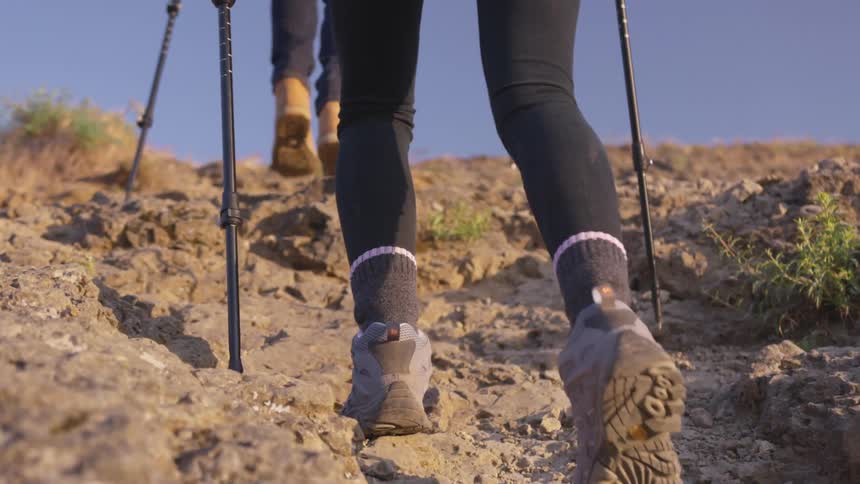 Two people are hiking outdoors