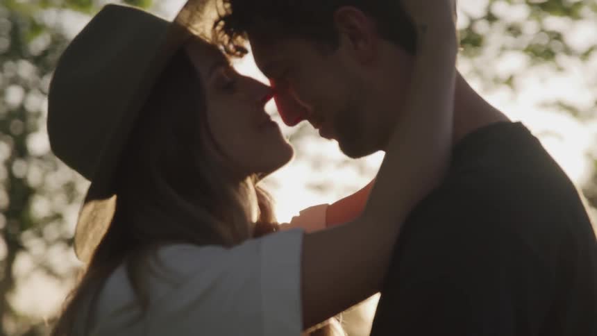 Girl kissing a man