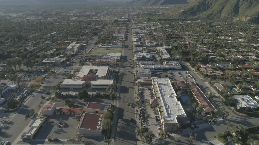 An aerial view of a neighborhood is displayed