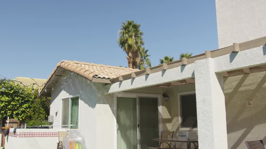 A patio in front of a house