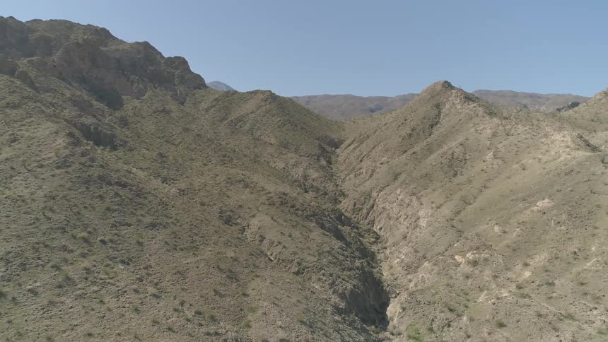 An aerial view through a mountain
