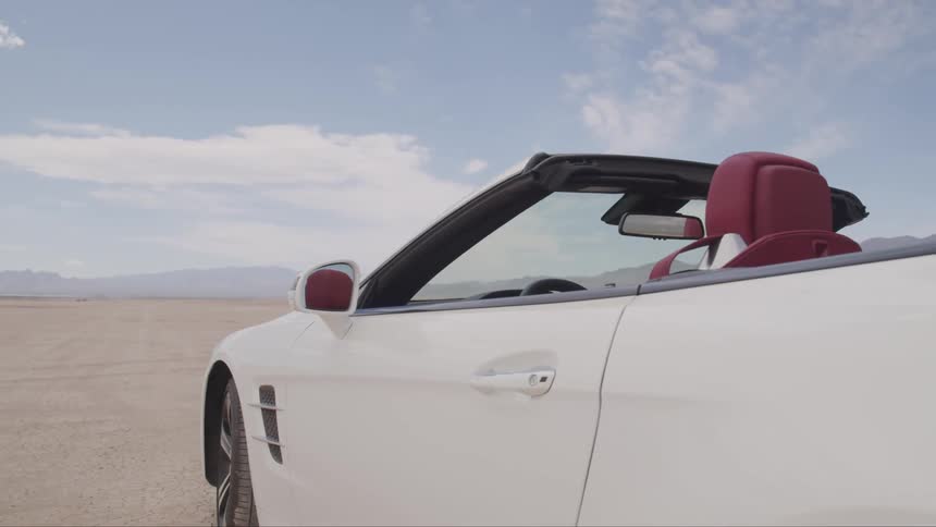 A car parked on sand