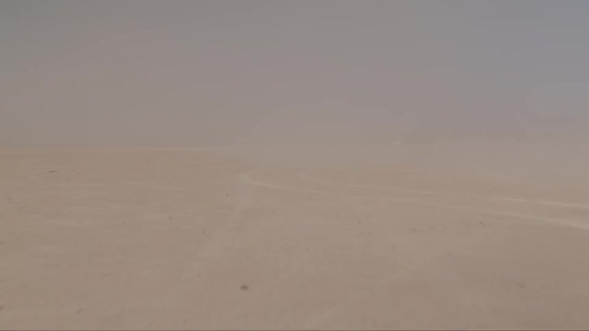 Tire tracks on packed desert sand