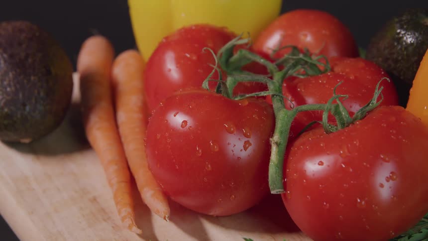A bunch of vegetables on a cutting board