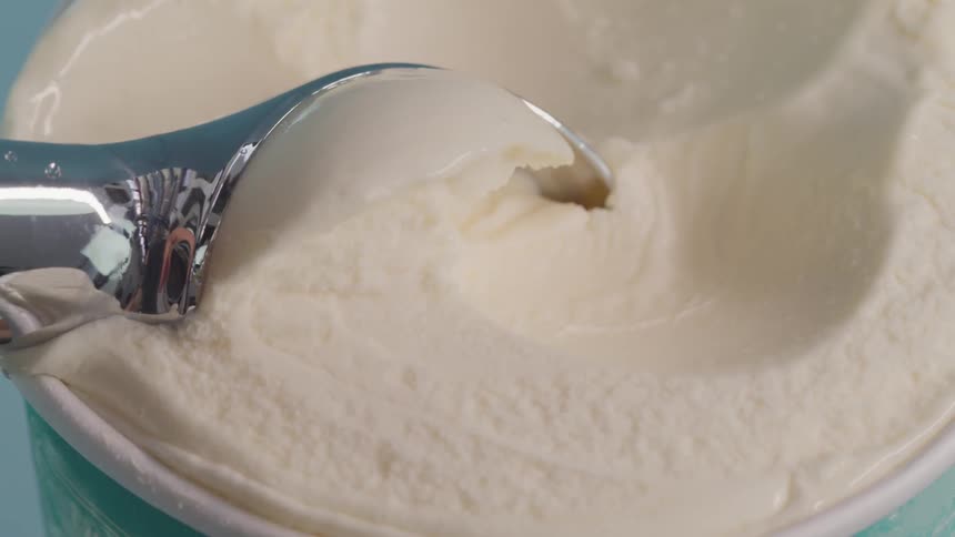A person is scooping ice cream