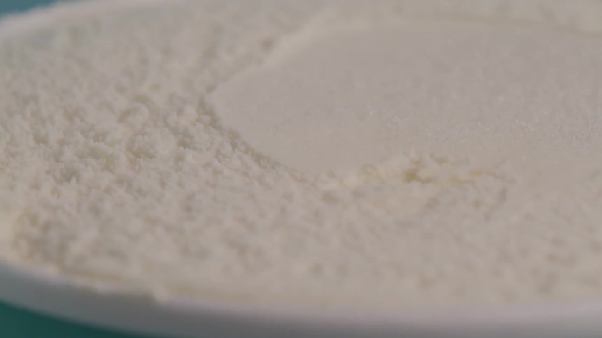 Close up of a finely grounded white material
