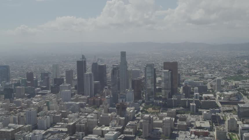 Skyline of the city with tall buildings on a cloudy day