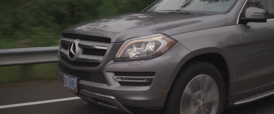 Tires spin on the vehicle as it travels down the highway