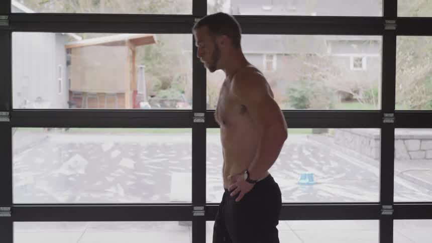 A man is resting after a workout