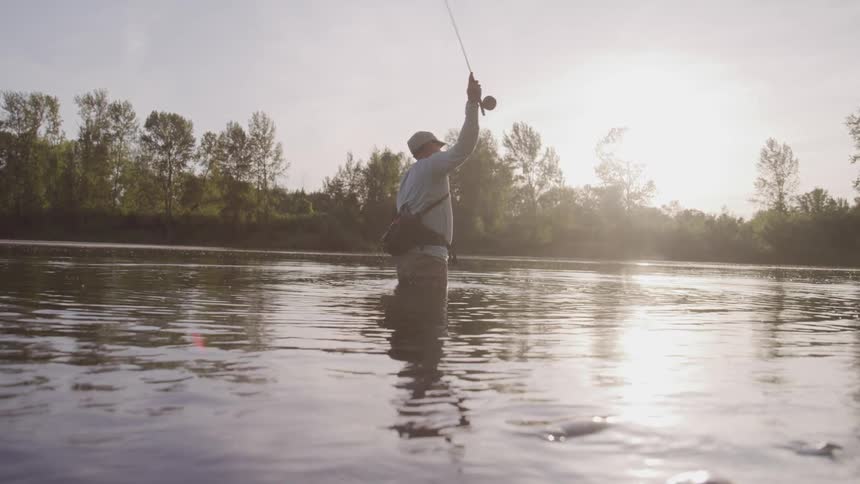 Male fly fishing