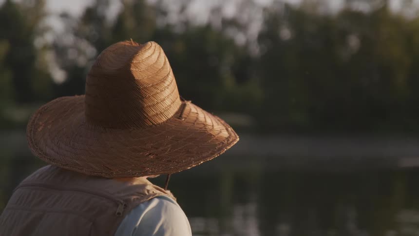 Man standing next to the water