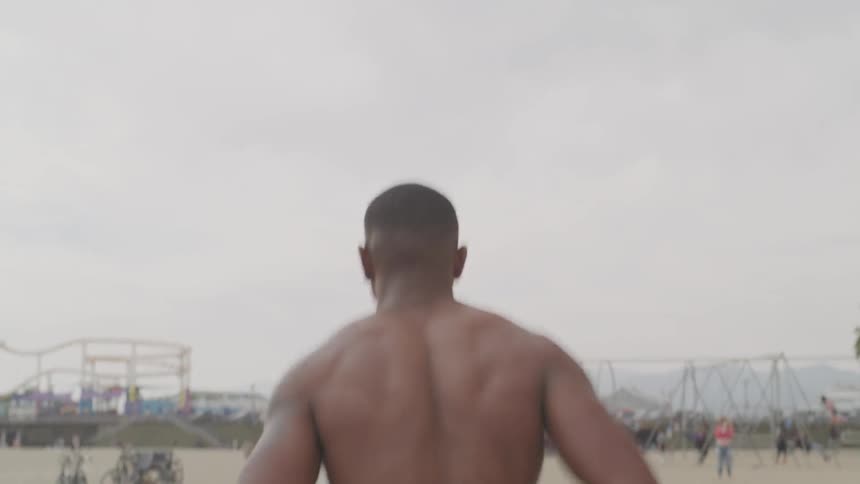 A man runs through a park