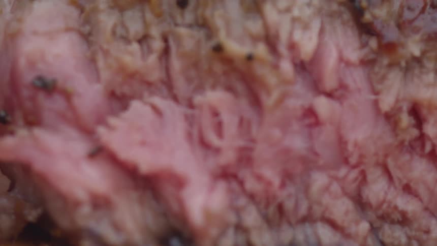 Cutting ham into slices