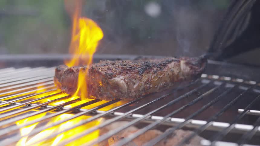Meat cooking on the grill