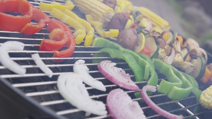 Fresh food being grilled on a charcoal grill