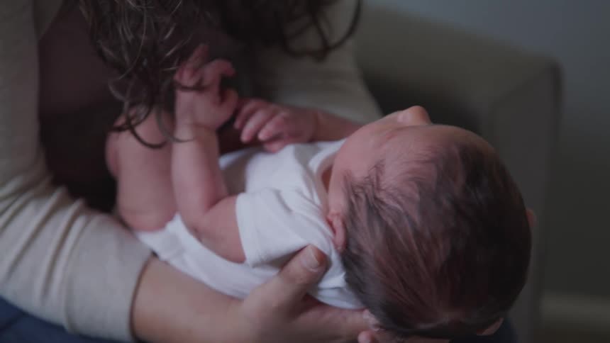 Mom holding a baby